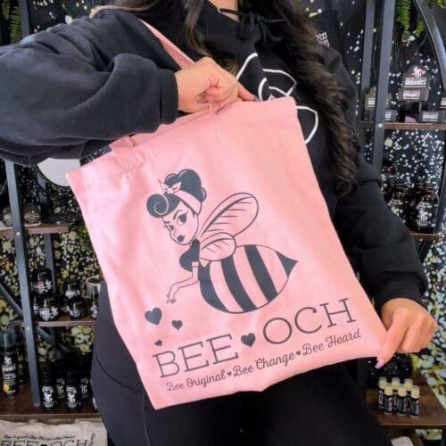 Large BEE-OCH Canvas tote bag in pink with hearts, bee logo, and tagline.
